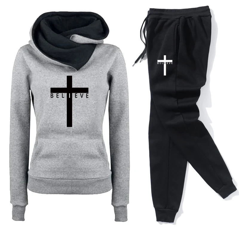 Amazing Woman's Tracksuit with a cross + believe image